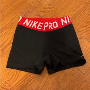 Black nike pros Red band